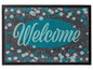 Eine graue Fußmatte mit blauen Punkten und dem Schriftzug 'Welcome'
