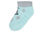 Babysocken mit Schneeflocken und Anti-Rutsch-Punkten.