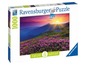 Ravensburger Puzzle mit 1000 Teilen, Naturmotiv mit Sonnenaufgang über Bergen.