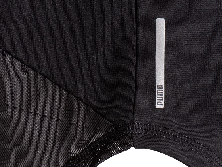 Schwarze Puma Sportbekleidung mit Mesh-Einsätzen.