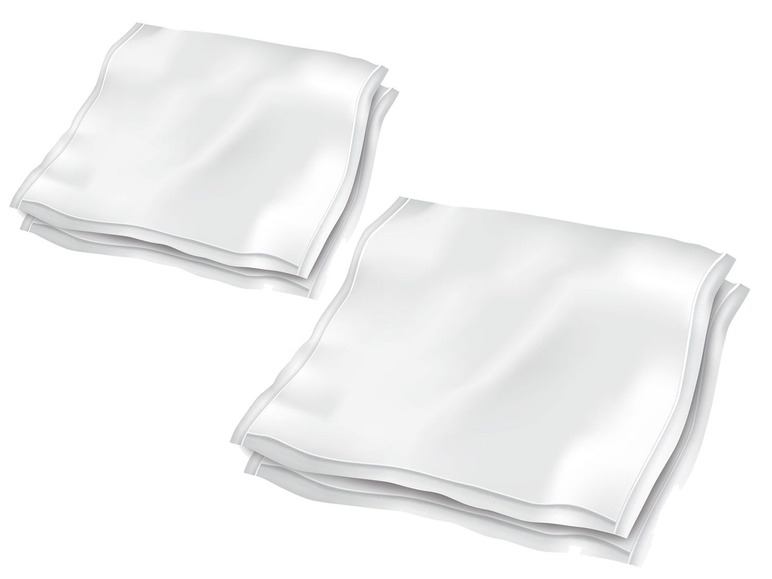 Zwei Stapel weiße Papierservietten.