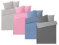 Bettwäsche in Grau, Rosa und Blau.