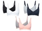 Drei Paar Still-BHs in Schwarz, Weiß mit Streifen und Grau/Rosa