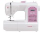 Eine weiße Singer Starlet Nähmaschine mit rosa Details.
