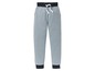 Graue Jogginghose mit schwarzen Bündchen.
