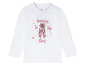 Weißes Langarmshirt mit Ballerinas und dem Text 'dancing to the stars'.