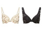 Zwei BHs mit Blumenmuster, einer weiß und einer schwarz.