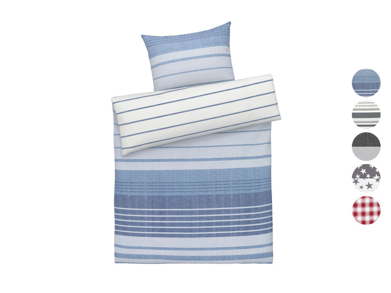 Ein gestreiftes Bettbezugset mit passendem Kissenbezug.