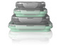 Ein Set aus vier stapelbaren Lunchboxen in Mintgrün und Grau.