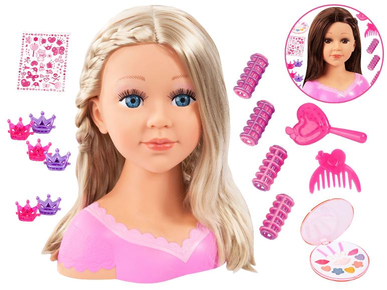 Blonder Frisierkopf mit Make-up, Lockenwicklern, Kamm, Bürste, Kronenklammern und Aufklebern.