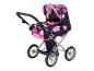Puppenwagen in Pink und Marineblau mit Sternenmuster.