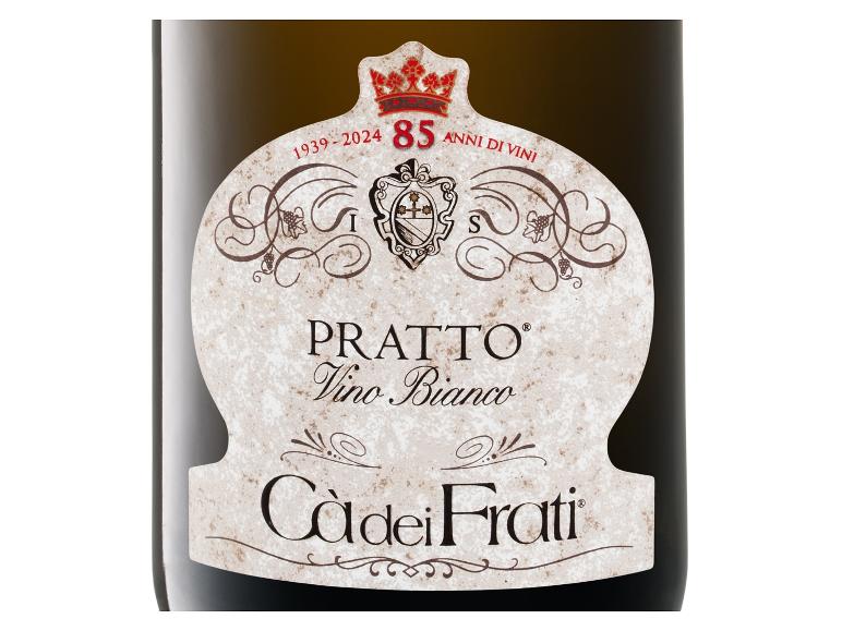 Etikett einer Weißweinflasche mit der Aufschrift „PRATTO Vino Bianco“ und „85 ANNI DI VINI“.