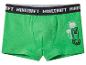 Grüne Boxershorts mit schwarzem Bund mit weißem Text und einer pixeligen Figur mit Palmen.