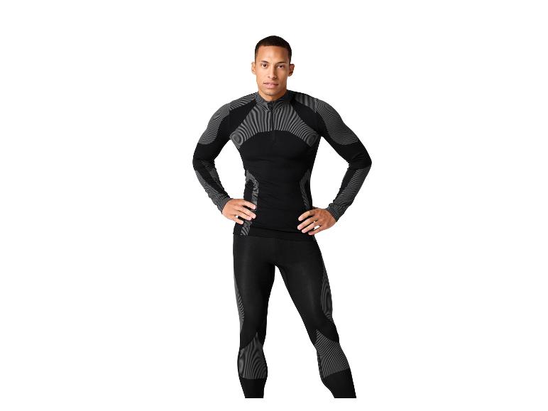Mann in schwarzen Leggings und Thermoshirt mit grauen Details.
