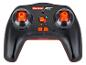Schwarze Carrera RC Fernbedienung mit orangefarbenen Tasten und Joysticks.