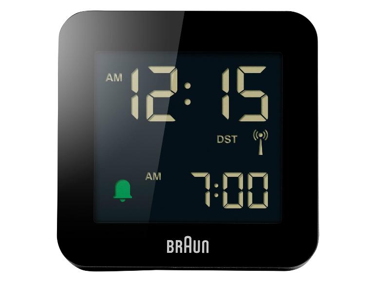 Schwarzer Digitalwecker mit Display, das 12:15 Uhr und Wecker auf 7:00 Uhr anzeigt.