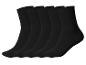 Fünf Paar schwarze Socken auf weißem Hintergrund.