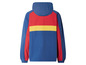 Eine blaue Windjacke mit roten und gelben Akzenten.