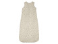 Beige Schlafsack mit Tupfenmuster.
