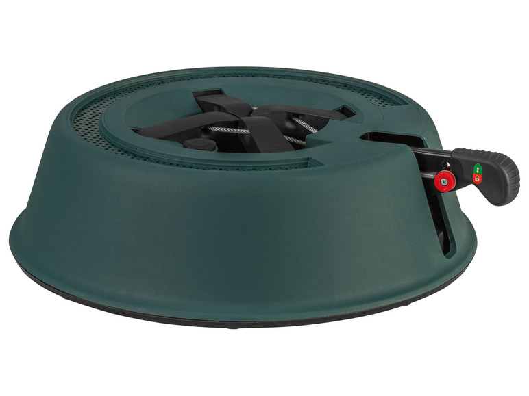 Ein grüner Weihnachtsbaumständer mit Drehmechanismus.