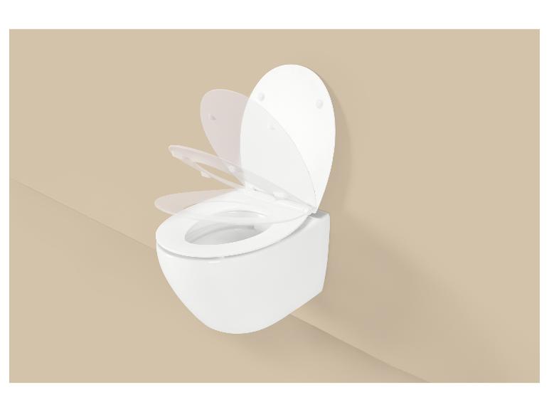 Soft-Close Toilettensitz in Bewegung auf beigem Hintergrund