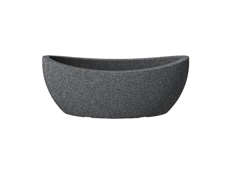 Großer, dunkelgrauer Pflanzenkübel in Bootsform.