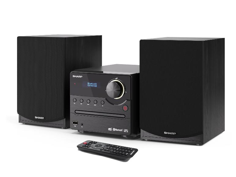 Schwarze Mikroanlage mit zwei Lautsprechern und Fernbedienung, Display zeigt „Bluetooth Connected“.