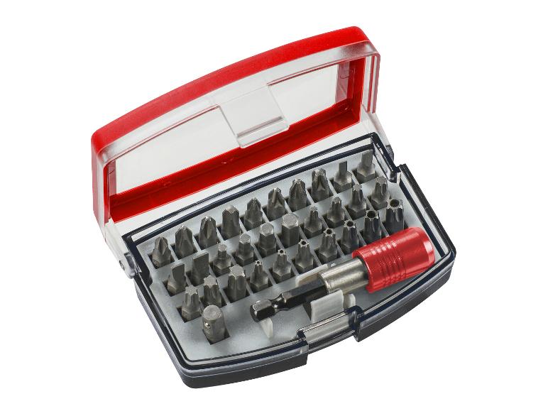 Schraubendreher-Set mit verschiedenen Bits und rotem Griff in transparenter Box.