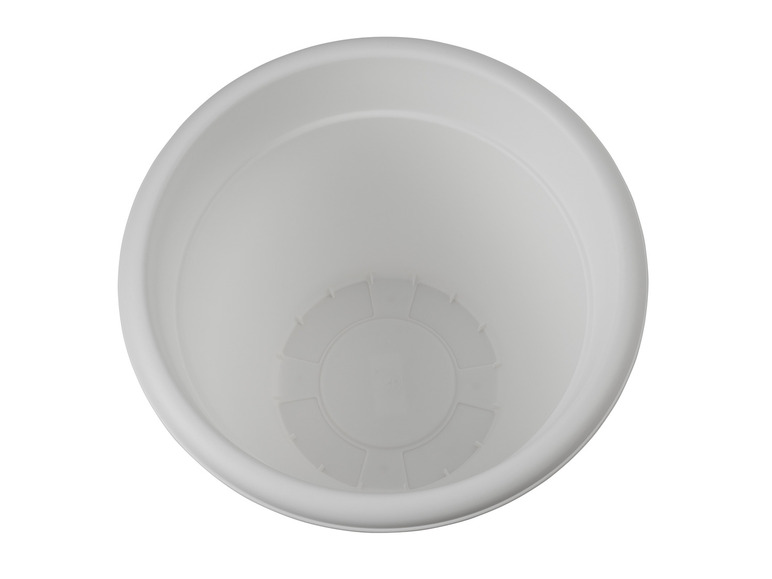 Ein weißer Plastiktopf von oben betrachtet.