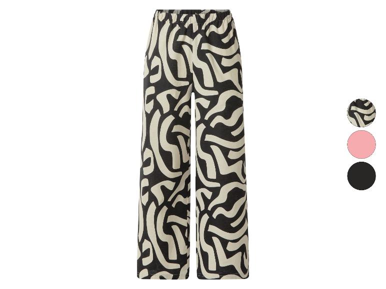 Damenhose mit abstraktem Schwarz-Weiß-Muster und elastischem Bund.