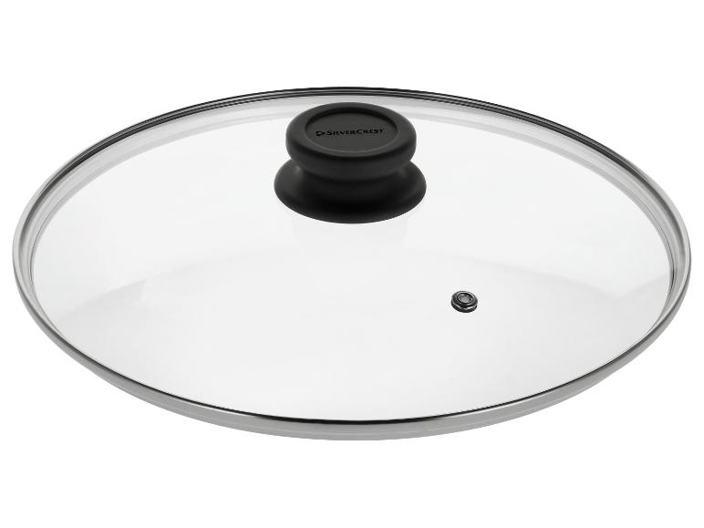 Glasdeckel für Topf mit schwarzem Griff und Metallrand.