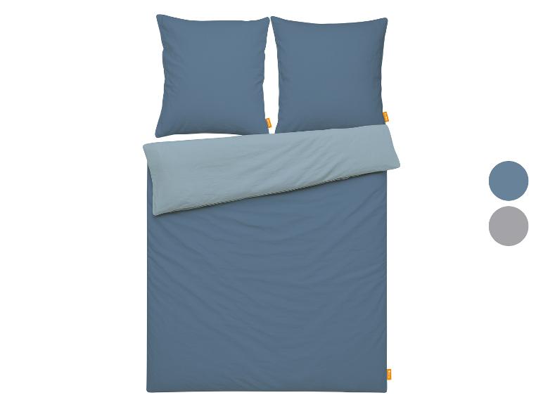 Wendebettwäsche in Blau und Hellblau mit zwei Kissenbezügen.