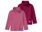 Zwei rosa Langarmshirts, eines gestreift und eines einfarbig.