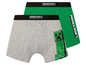 Zwei Minecraft Boxershorts, eine graue mit einem Creeper-Druck und eine grüne.