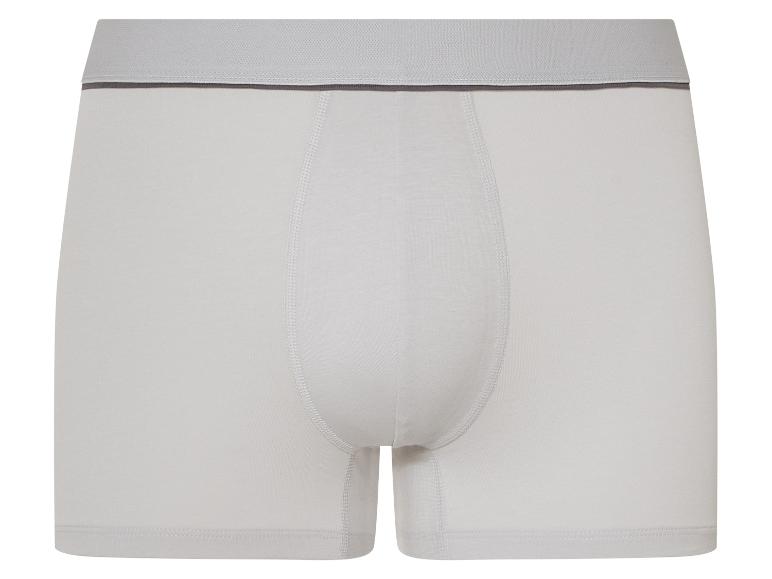 Weiße Herren-Boxershorts mit grauem Gummibund.