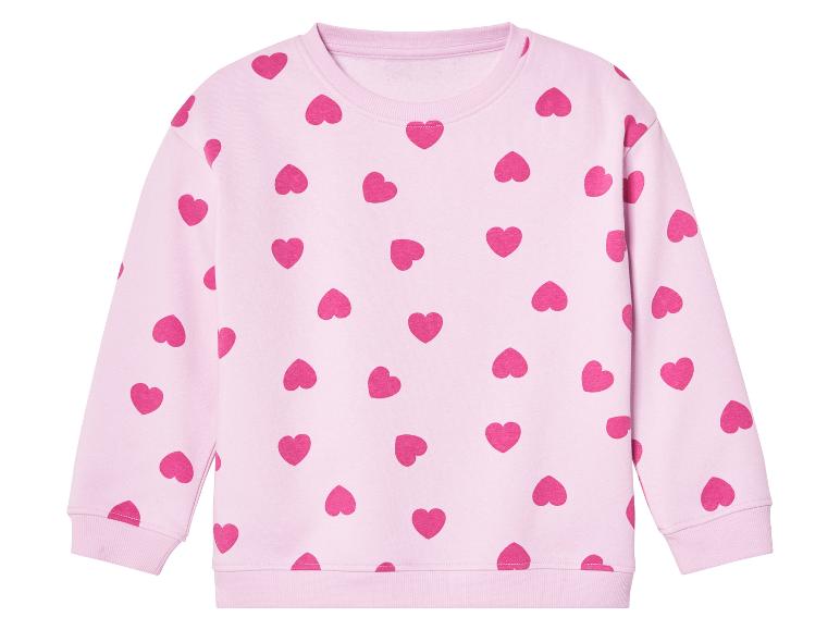 Rosa Kinderpullover mit Herz-Muster.