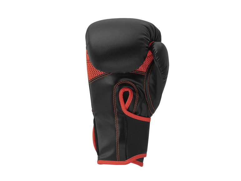 Ein schwarzer Boxhandschuh mit roten Akzenten.