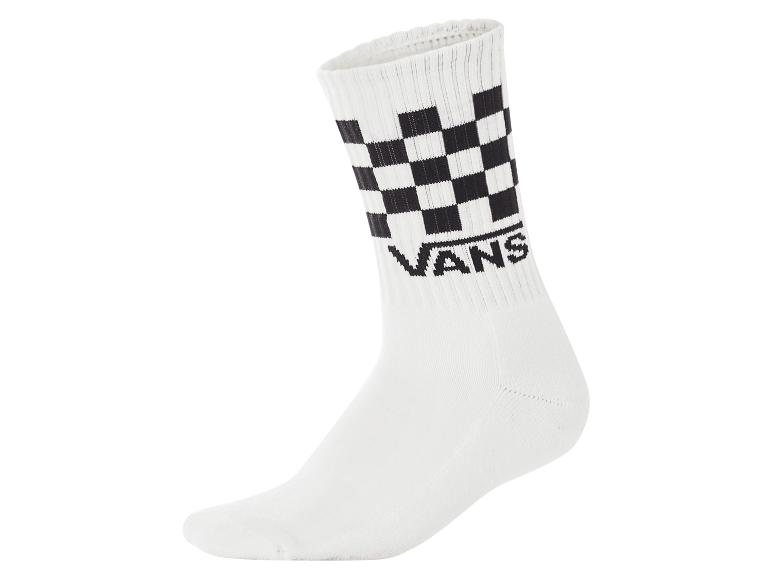 Weiße Socke mit schwarz-weißem Karomuster und schwarzem Text.