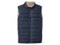 Dunkelblaue Steppweste mit beigem Innenfutter und Reißverschluss.
