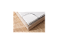 LIVARNO home 7-Zonen-Hybridschaummatratze Comfort Plus auf einem Bett.