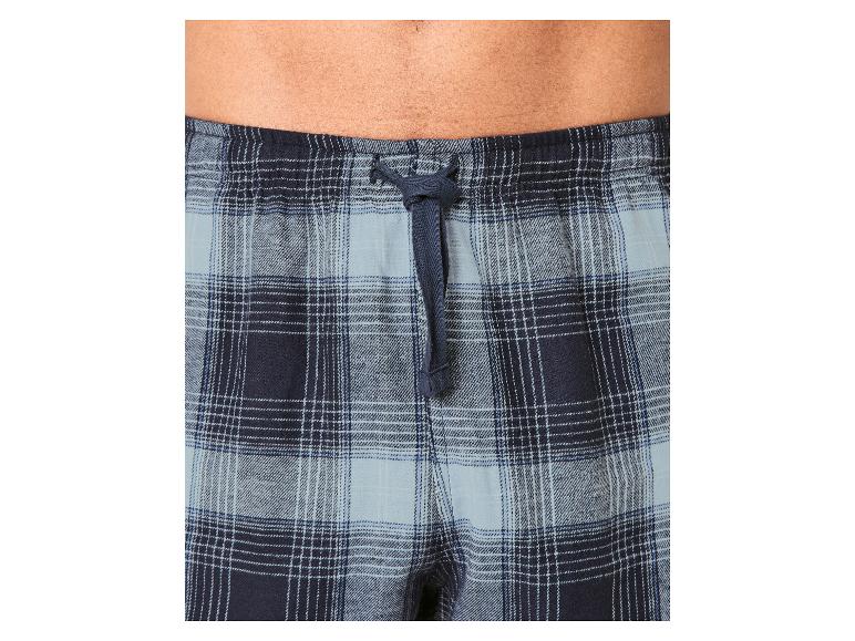 Nahaufnahme einer blauen karierten Herren-Pyjamahose mit Kordelzug.