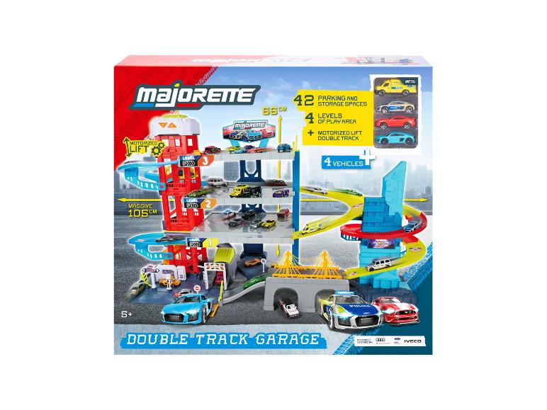 Mehrstöckige Spielzeuggarage mit 42 Parkplätzen, motorisiertem Aufzug und 4 Fahrzeugen.