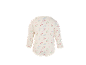 Langärmeliger Baby-Body mit Blumenmuster auf cremefarbenem Hintergrund.