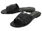 Schwarze flache Sandalen mit geflochtenen Riemen, mit Markenlogo auf der Innensohle.