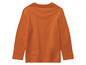 Ein orangefarbenes Langarmshirt für Kinder.