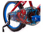 Ein rotes Kinderfahrrad mit blauen Reifen und einem Spiderman-Motiv.
