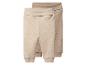 Zwei Babyhosen in Beige- und Hellbrauntönen