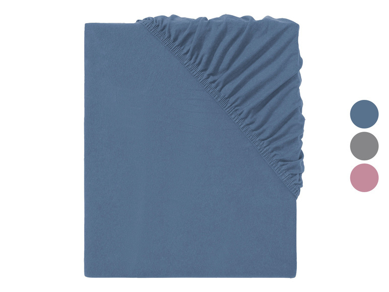 Ein dunkelblaues Spannbettlaken mit Gummizug.