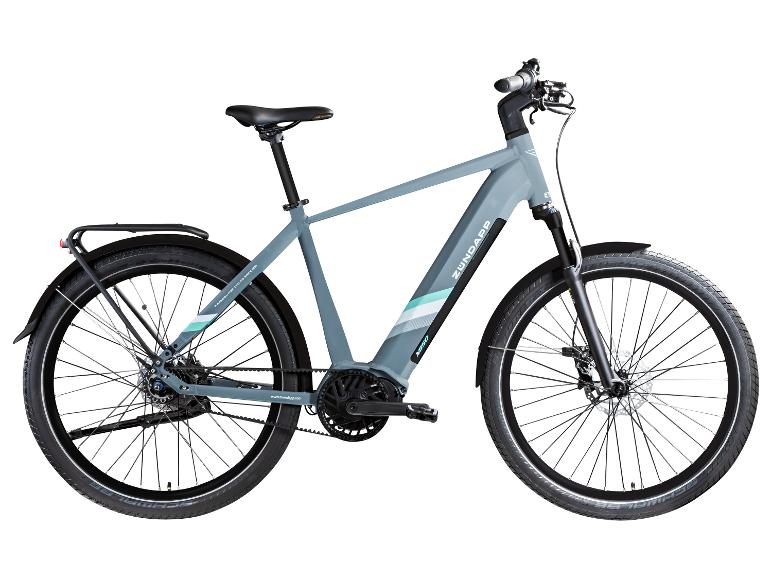 Graues Zündapp E-Bike mit Gepäckträger und Schutzblechen.