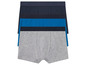 Drei Boxershorts in Grau, Blau und Dunkelblau.